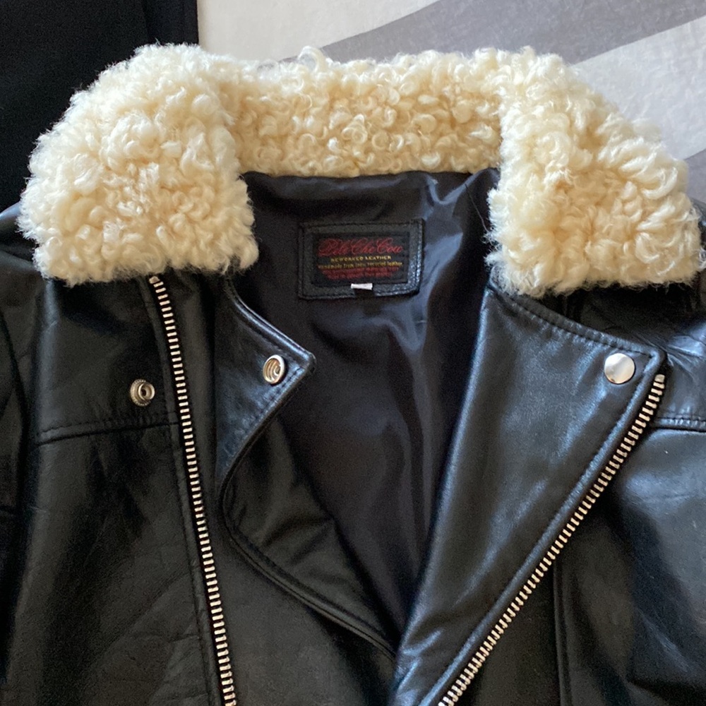 Black leather biker jacket with sheepskin collar